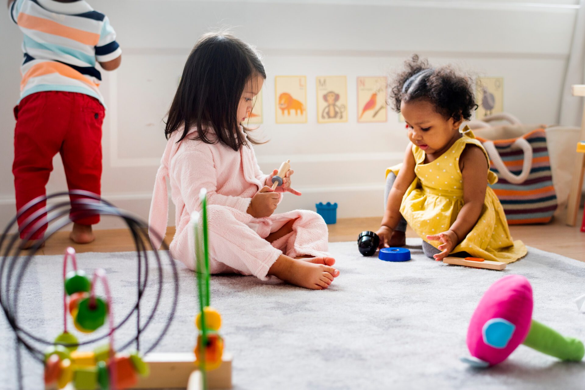Little,Kids,Playing,Toys,In,The,Playroom